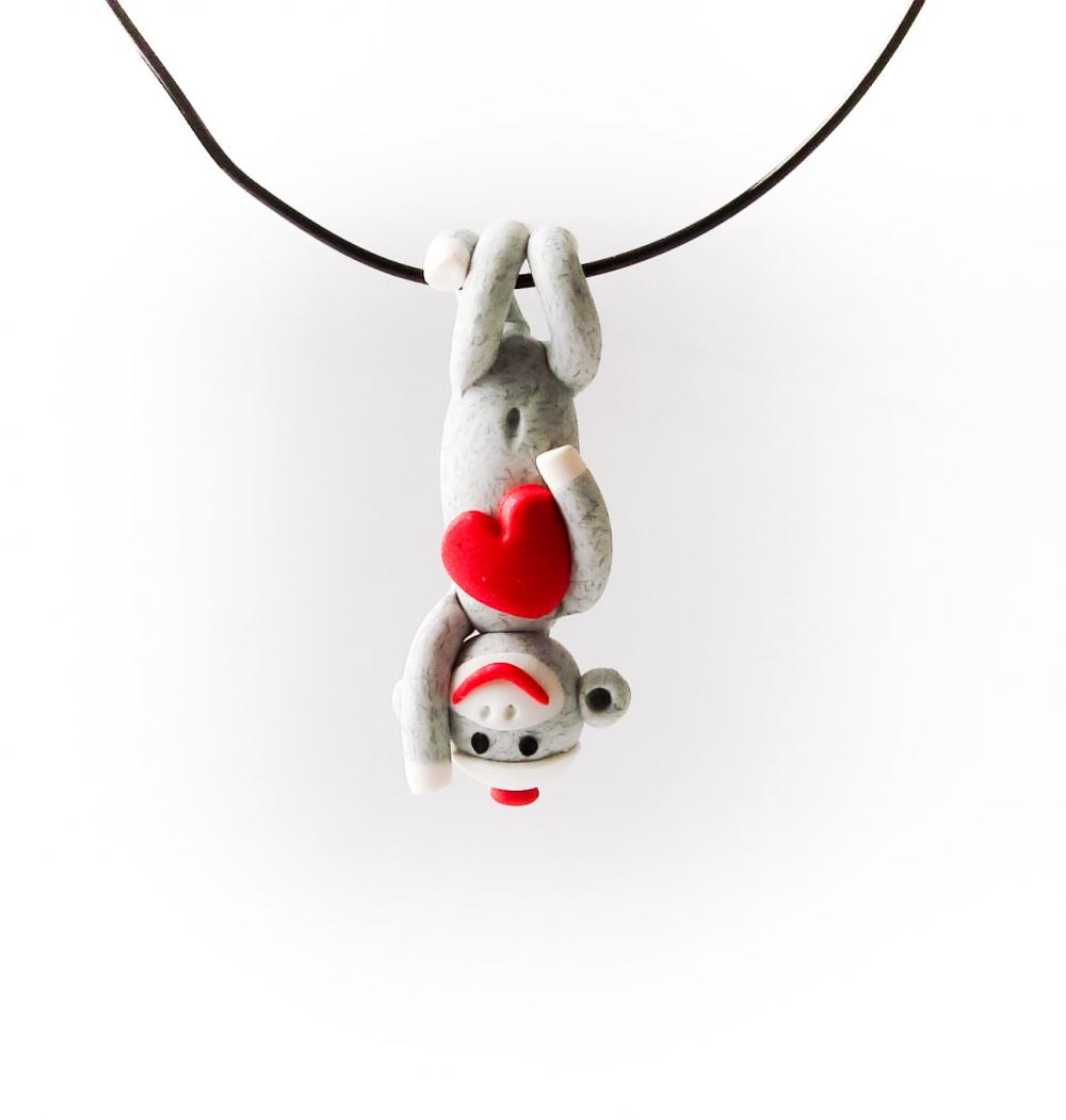 Grey Sock Monkey Pendant Swinging Upside Down Holding A Valentine's Day Heart